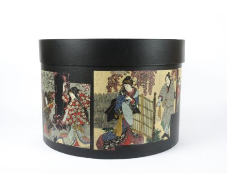 A quantity of bamboo and cane carriers and swing handled baskets together with a large hat box decorated with Japanese woodbl