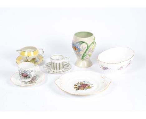 A selection of 19th and 20th Century ceramics, including a Clarice Cliff vase in the 'lily' pattern, a Victorian part-service