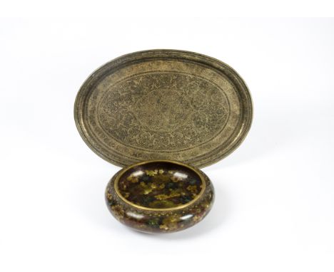 A cloisonne enamel bowl, a Chinese Ruyie repeating border, the cloisonne metalwork revealing a profusion of flowers, blue cou