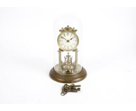 A 20th Century anniversary clock, brass structure, white enamel dial with Arabic numerals and floral decoration, mounted on a