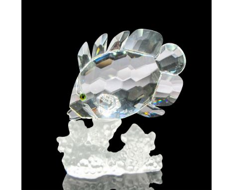 Part of the South Sea group. Detailed clear body and fins with yellow crystal eyes perched on frosted sea coral. Swarovski ba
