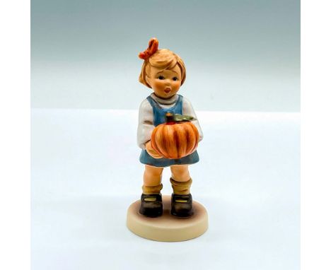 Special edition hand painted figure of a young girl holding a pumpkin. Goebel Hummel backstamp. HUM 2175/0. Issued: 2005Dimen