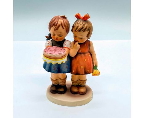 Hand painted figure of two girls celebrating a birthday. Goebel Hummel backstamp. HUM 176/0. Issued: c. 1972-1979Dimensions: 