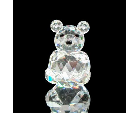 Clear faceted body with round ears and feet. Black crystal eyes. Swarovski backstamp. 7670032000. This item has its original 