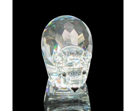 Part of the Kingdom of Ice and Snow group. Clear faceted body, round ears, black crystal eyes and nose. Swarovski backstamp. 