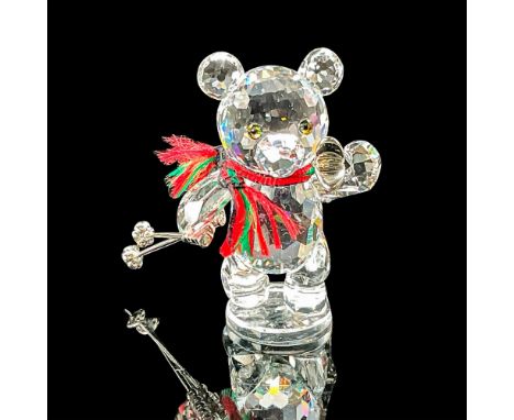 Lead crystal part of the Kris Bears collection and is made with fabric scarf and silver-tone skis and ski poles. Swarovski et