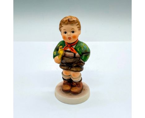 Hand painted figure of a young boy with a horn. Goebel Hummel backstamp. Issued: c. 1979-1990Dimensions: 2"L x 2"W x 4.5"HMan