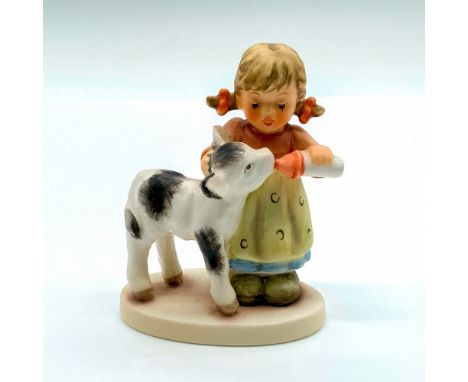 Hummel Figurine #2231; Matte porcelain, hand painted. Young girl feeding a calf. 'M. I. Hummel' inscribed on back of base. Go