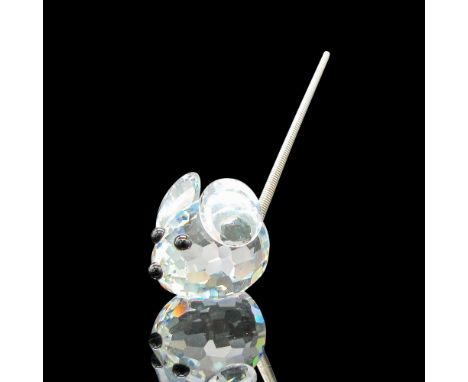Made from clear crystal, with black eyes and nose, the mini mouse has a metal spring coil tail and no base. Part of the Mini 