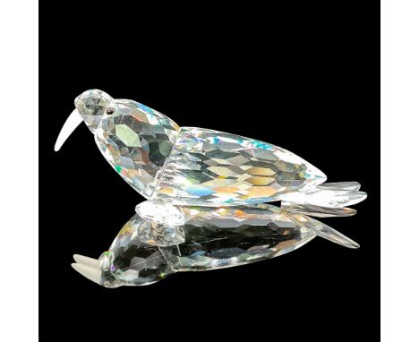 This crystal walrus was part of the Kingdom of Ice and Snow group. The walrus is made from clear crystal, with black eyes and