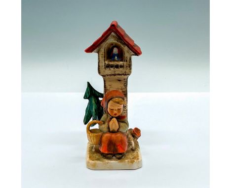 Hand painted figure of a young girl praying at a wayside cross. Goebel Hummel backstamp. Artist: Reinhold UngerIssued: 1938Di