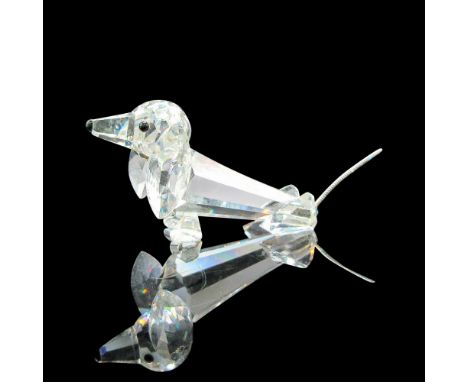 Clear faceted body with metal braided tail. Swarovski backstamp. 7641075000. This item has its original box: 3.25"L x 3.25"W 