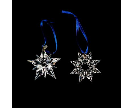 Lead clear crystals part of the Christmas Ornaments collection. They hang on blue satin ribbons, with a silver-tone metal han