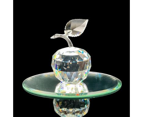 Lead clear crystal figure of an apple with a steam and a single leaf. Swarovski etched backstamp. This item has its original 