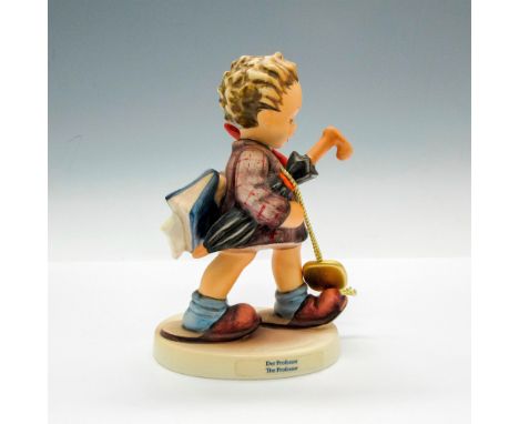 Hand painted figural with umbrella under arm, holding notebook and wearing large slippers. Hummel Goebel tag - Temporarily Wi