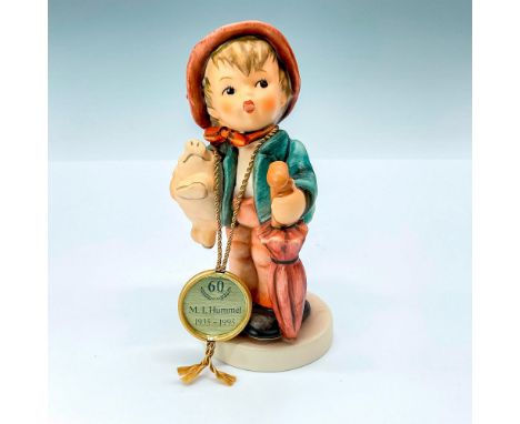 Limited edition M.I. Hummel with 60 years 1935 - 1995 Medallion. Depicts boy with pig and umbrella. Lucky Boy #335. Goebel ba