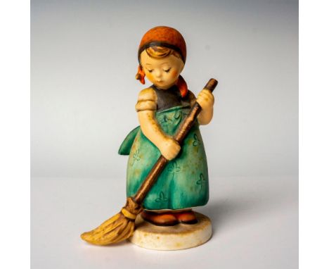 Hand painted in matte finish modeled as a young girl sweeping. M. I. Hummel impressed backstamp. Goebel backstamp. Dimensions