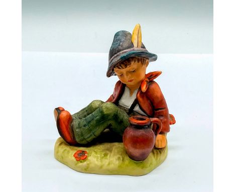 Exclusive special edition hand painted figure of a young boy resting. Goebel Hummel backstamp. Issued: c. 1979-1990Dimensions