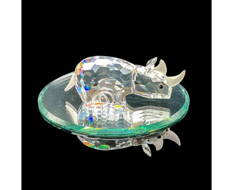 Lead crystal part of the African Wildlife series and is made with frosted crystal horns and tail. Swarovski etched backstamp.