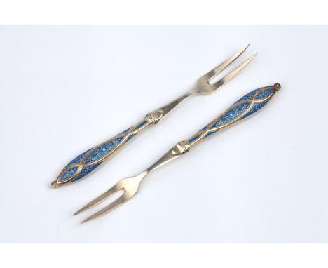 A PAIR OF NORWEGIAN PASTRY FORKS by Marius Hammer with blue enamel inset shaped handles, stamped M.H. 830s (2)