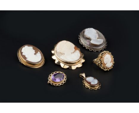 A COLLECTION OF CAMEO JEWELLERY, comprising two oval shell cameo brooches, each carved to depict a female portrait profile, 9