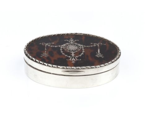 AN EDWARDIAN SILVER AND TORTOISESHELL OVAL TRINKET BOX, the hinged lid with piqué inset swags and musical instruments, by Wil