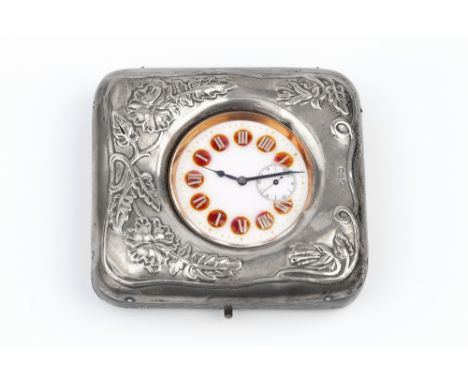 AN EDWARDIAN SILVER MOUNTED WATCH CASE/STAND, repoussé decorated with sinuous foliage, Chester 1902, containing a large Argen