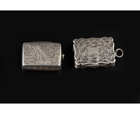 TWO VICTORIAN SILVER RECTANGULAR VINAIGRETTES, the first of shaped outline and engraved with stylised foliage, by Thomas and 