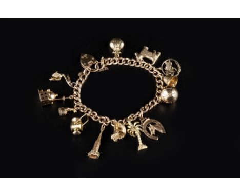 A CHARM BRACELET, the curb-link bracelet stamped '9 .375', with 9ct gold padlock clasp, suspending a collection of charms, to