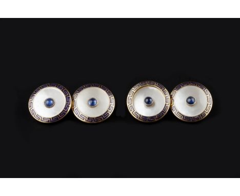 A PAIR OF SAPPHIRE, MOTHER OF PEARL AND ENAMEL CUFFLINKS, each circular mother of pearl panel centred with a cabochon sapphir