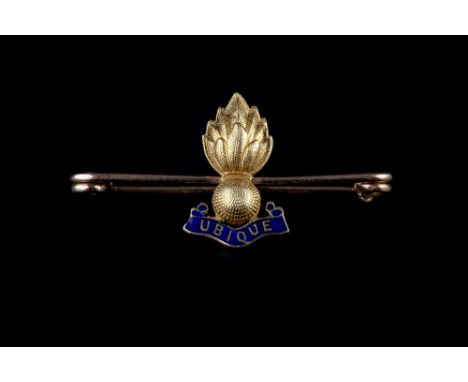 AN ENAMEL REGIMENTAL BAR BROOCH FOR THE ROYAL ENGINEERS, depicting a grenade, above the motto Ubique against a blue enamel gr