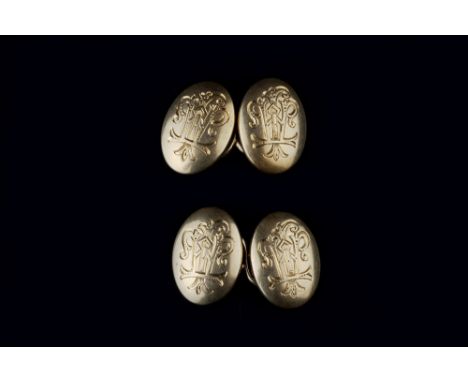 A PAIR OF CUFFLINKS, comprising oval convex panels with figure-of-eight fittings, monogrammed, stamped 'BH 18ct', panel lengt