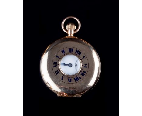 A 9CT GOLD HALF HUNTER POCKET WATCH, the white enamel dial with Roman numerals and subsidiary seconds dial, to a keyless wind