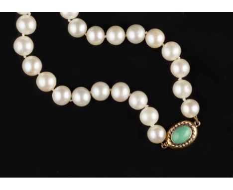 TWO CULTURED PEARL NECKLACES AND A PAIR OF EAR STUDS, comprising a single strand uniform cultured pearl necklace, with turquo