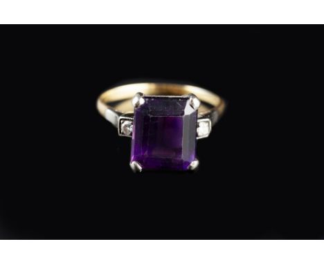 A COLLECTION OF JEWELLERY, comprising an amethyst and diamond dress ring, the rectangular step-cut amethyst claw set between 