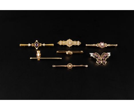 A COLLECTION OF BROOCHES, comprising a ruby and opal cluster bar brooch, 9ct gold mounted, a ruby and diamond set butterfly b