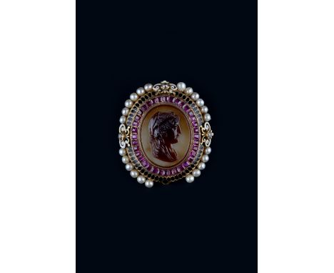 A 19TH CENTURY AGATE, ENAMEL AND GEM SET CAMEO BROOCH, SIGNED G. BISSINGER, circa 1870, the oval banded agate panel carved to