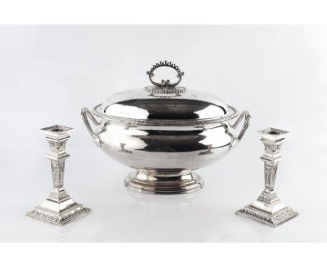 A QUANTITY OF SILVER PLATED ITEMS TO INCLUDE: a beaded oval tureen and cover, three entrée dishes and covers, a pair of candl