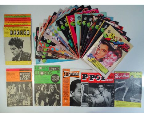 A large group of music related magazines to include covers featuring Elvis, David Bowie, The Bee Gees, and Bob Dylan (30+)