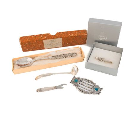 An Arts and Crafts silver spoon,by Amy Sandheim, London 1927,spot-hammered bowl, pierced handle, plus a Georg Jensen Rope pat