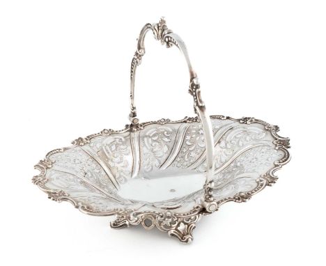 A Victorian silver swing-handled basket,by Henry Wilkinson &amp; Co, Sheffield 1845,oval form with a beaded scroll border, pi