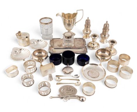 A mixed lot of silver items,comprising: a desk stand by Goldsmiths &amp; Silversmiths Co Ltd., London 1915, a pair of Edwardi