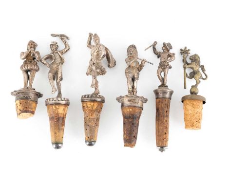 A collection of six silver and metalware novelty figural cork stoppers,two by Thomas White, London 1900,modelled as a Scottis