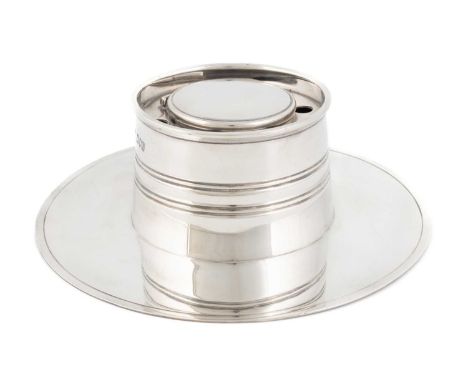 An Edwardian silver capstand inkwell,by George Leonard Allen, London 1907, circular form with bands of reeded decoration, fiv