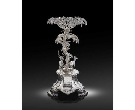 A Victorian silver épergne/centrepiece,by The Barnards, London 1856,the central column modelled as an oak tree, supporting a 