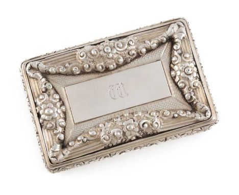 A William IV silver snuff box,by Edward Smith, Birmingham 1836,rectangular form with reeded scroll foliate border and engine-