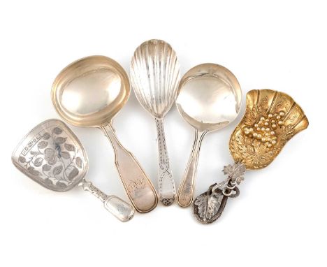 A collection of five antique silver caddy spoons, including: a Victorian naturalistic one, by Hilliard and Thomason, the shov
