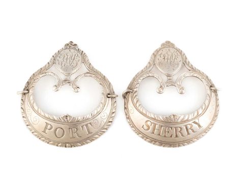 A pair of George III silver wine labels, by Hester Bateman, London circa 1780,  scroll form, with a raised pediment and urn, 