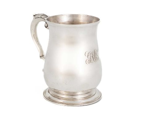 A George II silver mug, by Thomas Whipham, London 1746,baluster form, scroll handle, with scratched initials to the underside