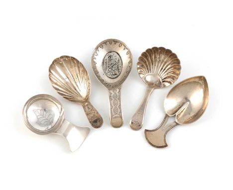 A collection of five antique silver caddy spoons, including: a George III one by Samuel Pemberton, Birmingham 1805, oval bowl
